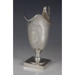 A George III silver helmet shaped cream jug, Peter & Ann Bateman, London 1793, with bright cut