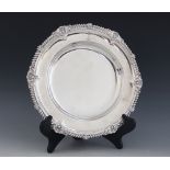 A George IV silver soup plate, Waterhouse, Hodson & Co, Sheffield 1824, bearing the crest for the