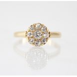 A Victorian diamond cluster ring, the central old European cut diamond measuring 3.25mm diameter,