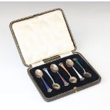 Six silver and enamel coffee spoons by Magnus Aase, each with tapering handle and pierced