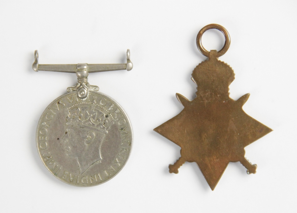 An unissued World War I 1914-15 Star, the reverse blank, and a World War II War Medal 1939–1945 ( - Image 2 of 2