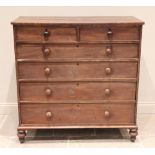 A mid-19th century mahogany chest of drawers, formed from two short over four long graduated, cock