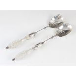 A pair of Victorian cut glass and silver salad servers, Mappin & Webb, Sheffield 1885, the oval