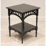 An Arts & Crafts ebonised occasional table, in the manner of E.W Godwin, circa 1900, the square