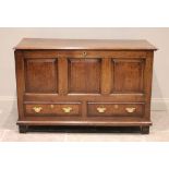 A George III oak and mahogany cross banded mule chest, the rectangular hinged top opening to a