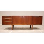 A mid 20th century McIntosh of Kirkcaldy teak sideboard, the pair of central cupboard doors