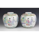 A pair of Chinese famille rose ginger jars, possibly Republic period, each ovoid jar decorated