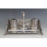 A Victorian silver desk stand, Barnard & Sons Ltd, London 1873, the rectangular base raised on