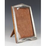 An Art Deco silver mounted photograph frame, Henry Williamson Ltd, Birmingham 1921, of tapered