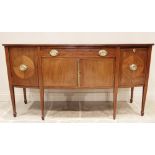 A 19th century bow front mahogany sideboard, formed from a single frieze drawer over a pair of