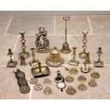 A collection of brassware to include; a cast foxes mask door porter, 28cm high, a bell shaped door