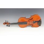 A violin baring maker's label "Hannibal Fagnola Fecit Taurini anno Domini 1920", two piece back, the