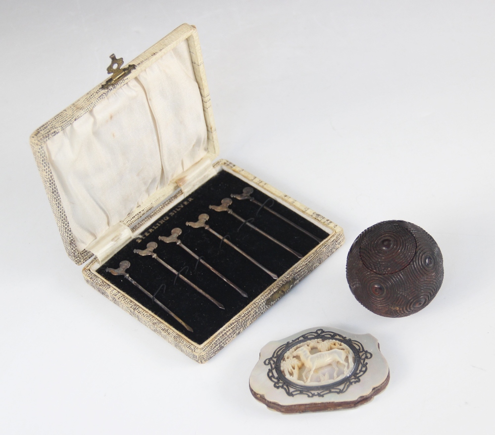 A treen puzzle ball, 19th century, with carved roundels and ribbed detailing, with push out - Image 2 of 3