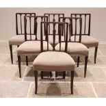 A well matched set of six 19th century Sheraton style mahogany dining chairs, each with a rail back,