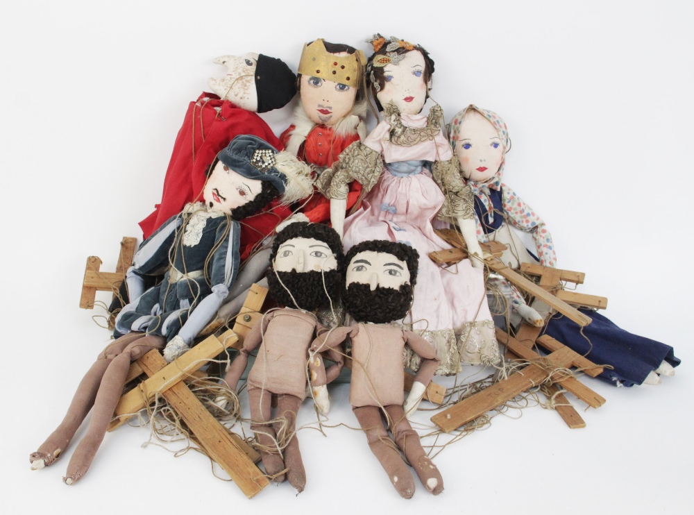 Eight vintage handmade marionettes, early 20th century, in various costumes, the tallest 53cm