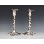 A pair of George III silver candlesticks, John Hyatt & Charles Semore, London 1760, each with