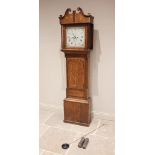 A George III oak and mahogany crossbanded eight day longcase clock, signed E Richards, Dolgellau,
