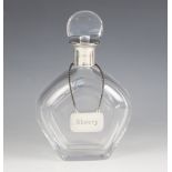 A continental silver mounted glass decanter, the pentagonal body with plain polished mount