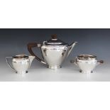 An Art Deco silver tea service, Henry Clifford Davis, Birmingham 1932, comprising teapot, milk jug