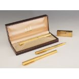 A Dunhill fountain pen with 18ct gold nib, 13.5cm long, complete in box, together with a further