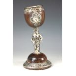 An 17th/18th century and later silver coloured mounted coconut cup / chalice,
