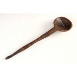 A Welsh carved spoon or Lledwad, probably fruitwood, late 19th/early 20th century, of typical form