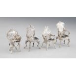 A selection of continental miniature silver and silver coloured doll’s house furniture, to include