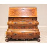 A figured walnut Dutch style bombe bureau, late 20th century, the cross banded fall front opening to