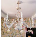 An Italian style ceramic eight branch chandelier, late 20th century, the wrythen baluster stem