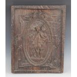 A 19th century carved oak panel, possibly German, carved in relief with three musicians enclosed