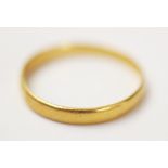 A 22ct gold wedding band, marks for 'HA', Birmingham 1938, ring size U 1/2, weight 3.4gms