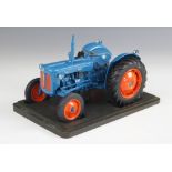A 1/16 scale die-cast model 1958 Fordson Dexta tractor, made in 2005 by Tractoys for G & M Farm