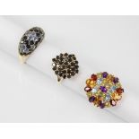 A 14ct gold multi-gem set ring, the oval cluster comprising oval, round and pear cut semi-precious