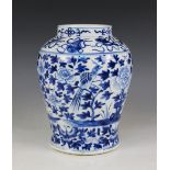 A Chinese porcelain blue and white vase, Kangxi mark, 19th century, of high shouldered cylindrical