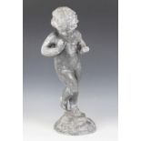A 19th century lead figure of a putti, modelled with right arm and leg raised, upon a naturalistic