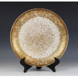 A Japanese Satsuma porcelain charger, Meiji Period (1868-1912), of circular form and extensively