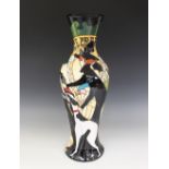 A Limited Edition Moorcroft vase, of large proportions, decorated in 'The Dog Walkers' pattern by