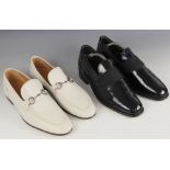 A pair of white leather Gucci princetown loafers, with classic horsebit detail and leather sole,