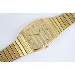 A gentleman's vintage Girard-Perregaux gold plated wristwatch, the square textured gold coloured