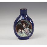 A Chinese blue-ground Yixing stoneware snuff bottle, 19th century, decorated with two reserves