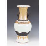 A large Chinese porcelain craquelure baluster vase, 19th century, glazed in celadon and batavian