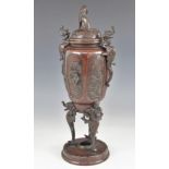 A Japanese bronze vase and cover, Meiji Period (1868-1912), the body of the vase relief moulded with