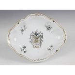 An 18th Chinese export Armorial dish, Qianlong (1735-1796), centrally decorated with a coat of