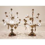 A pair of gilt brass and opaline glass five branch foliate candelabra, late 19th/early 20th century,