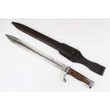 A German WWI bayonet, stamped "E & F Horster, Solingen", 52cm long, complete with metal scabbard