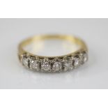 A diamond half eternity ring by Boodle & Dunthorne, comprising seven round brilliant cut diamonds,