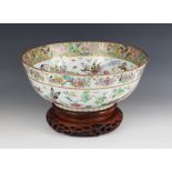 A Chinese Canton porcelain centre bowl, 19th century, of large circular proportions extensively