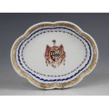 An 18th Chinese export Armorial dish, Qianlong (1735-1796), centrally decorated with a coat of