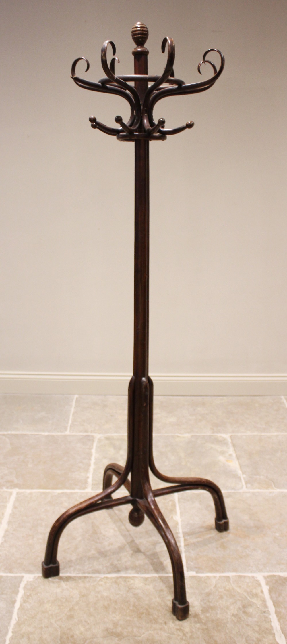 A mid 20th century bentwood coat/hat stand, the six 'S' shaped hooks raised upon a moulded cluster