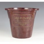 An early 20th century Bakelite champagne bucket, of tapering cylindrical form with twin-handles,